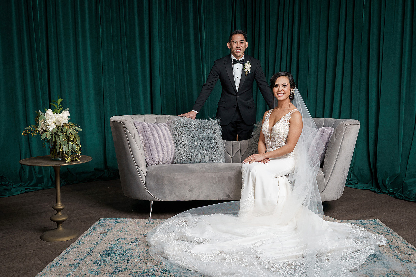 Bride and groom, emerald drape